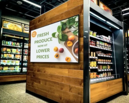 Content management system dashboard for retail shelf-edge digital signage showing scheduling and proof-of-play analytics